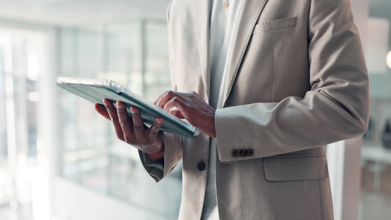 Businessman using tablet in modern office
