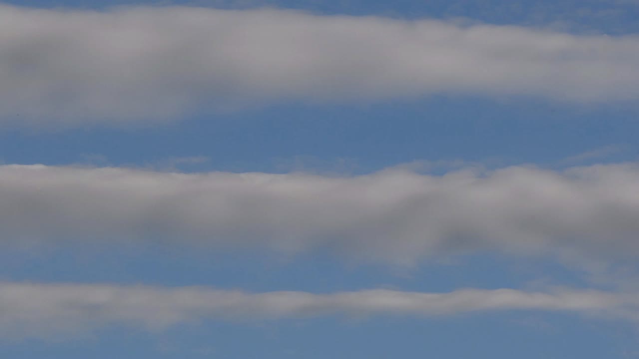 Striped Clouds in a Blue Sky