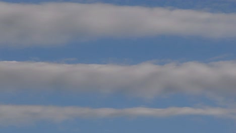 striped clouds in a blue sky