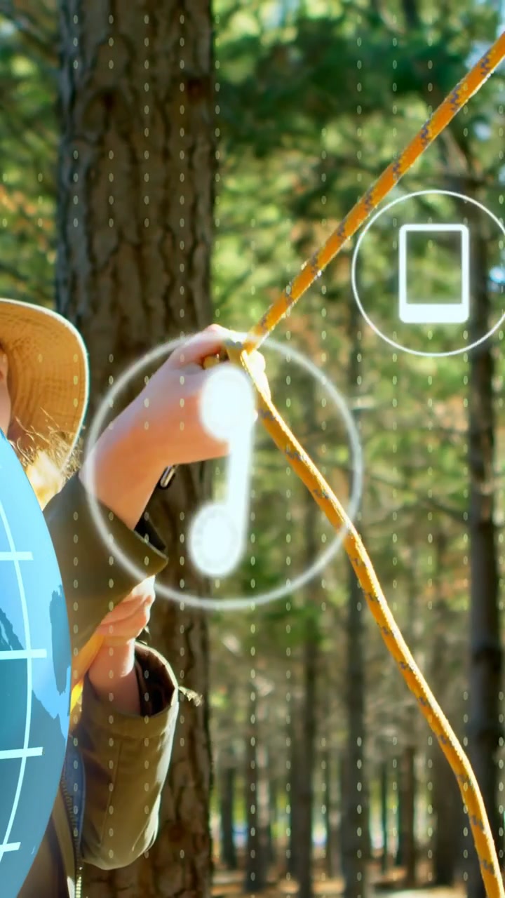 Vertical video: Woman pulling rope as globe appearing securing tent knot tech icons orbiting hands