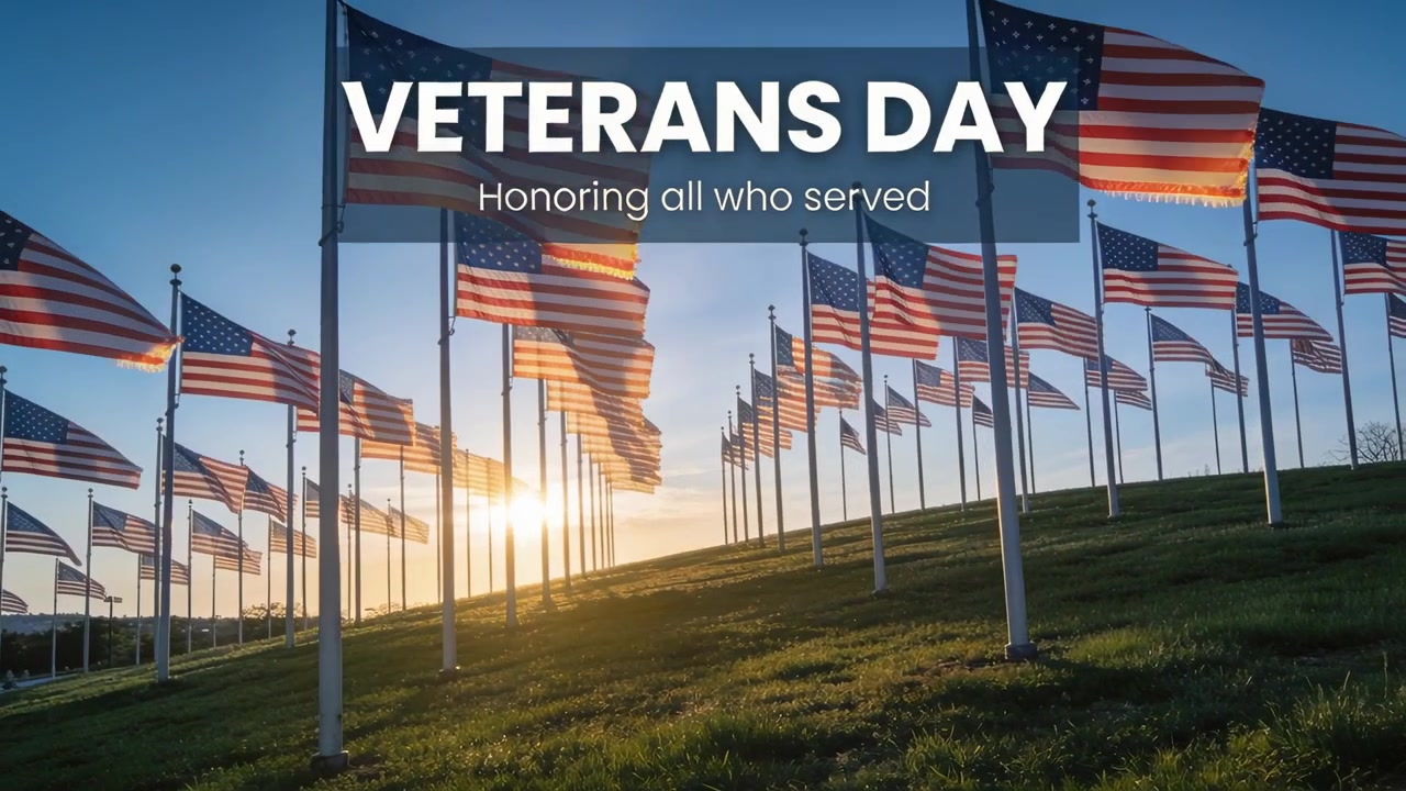 Bandiere degli Stati Uniti che sventolano su aste al vento sotto il sole, sovrimpressione del Veterans Day in onore dei veterani