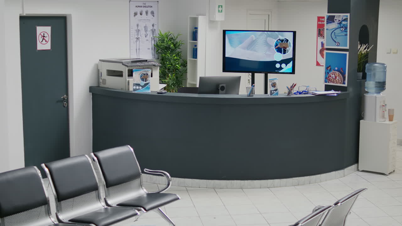 Empty hospital waiting room in lobby with reception counter