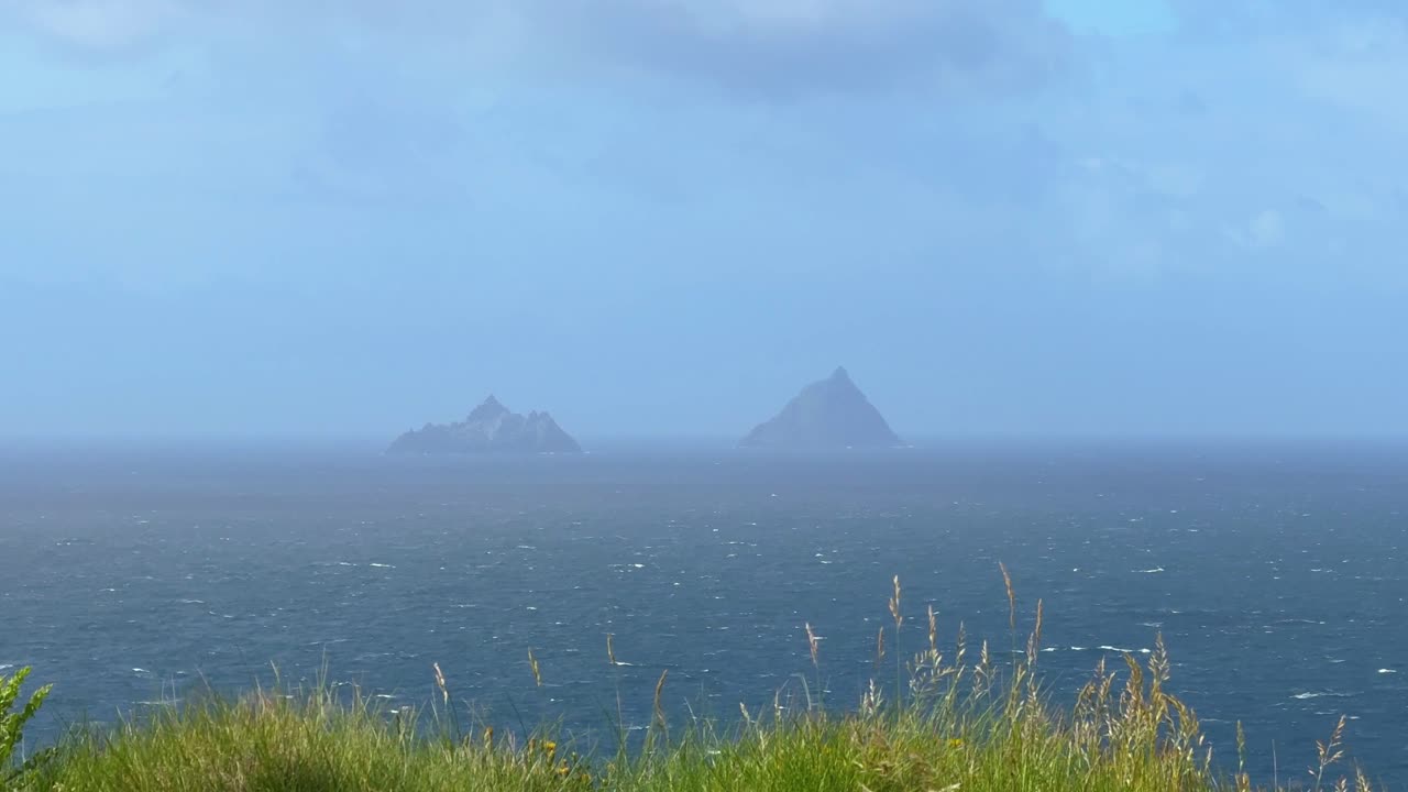 Ireland Skellig Islands in sea fog view from The Kerry Sea Cliffs must see for tourists on the wild Atlantic way