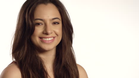 Young-Woman-Smiling-at-Camera