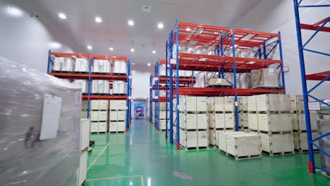 retail warehouse with pallets shelves, packed goods cardboard boxes. logistics center for transportation and product distribution