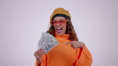 happy woman, money fan and pointing in winning