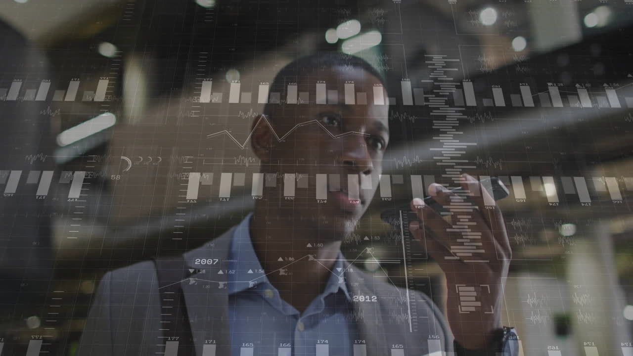 Analyzing financial data charts, businessman in office with animation overlay