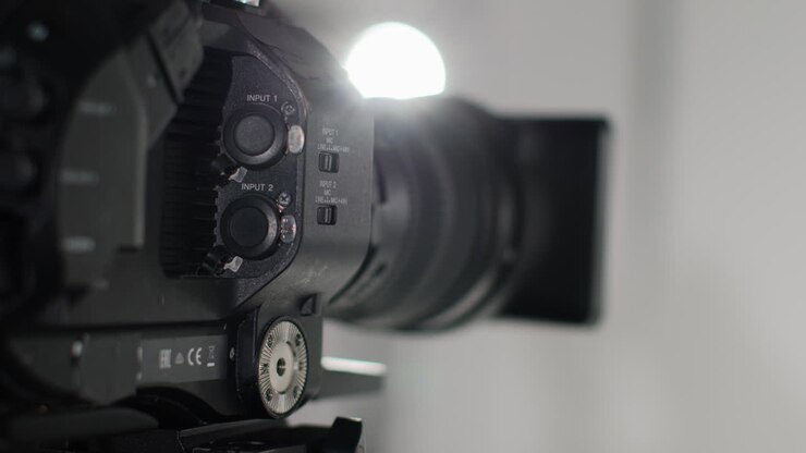Close Up Of Film Or Video Camera Shooting Movie Or Video In Studio