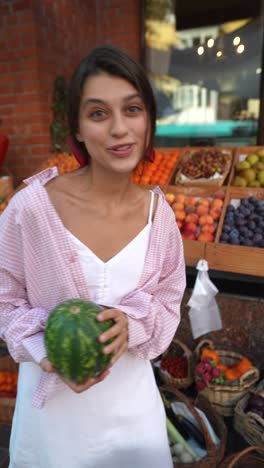 woman shopping for fresh fruits and vegetables at a market