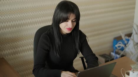 professional woman in a modern office environment, focused on work, dressed elegantly in business attire, surrounded by office equipment and a sleek interior