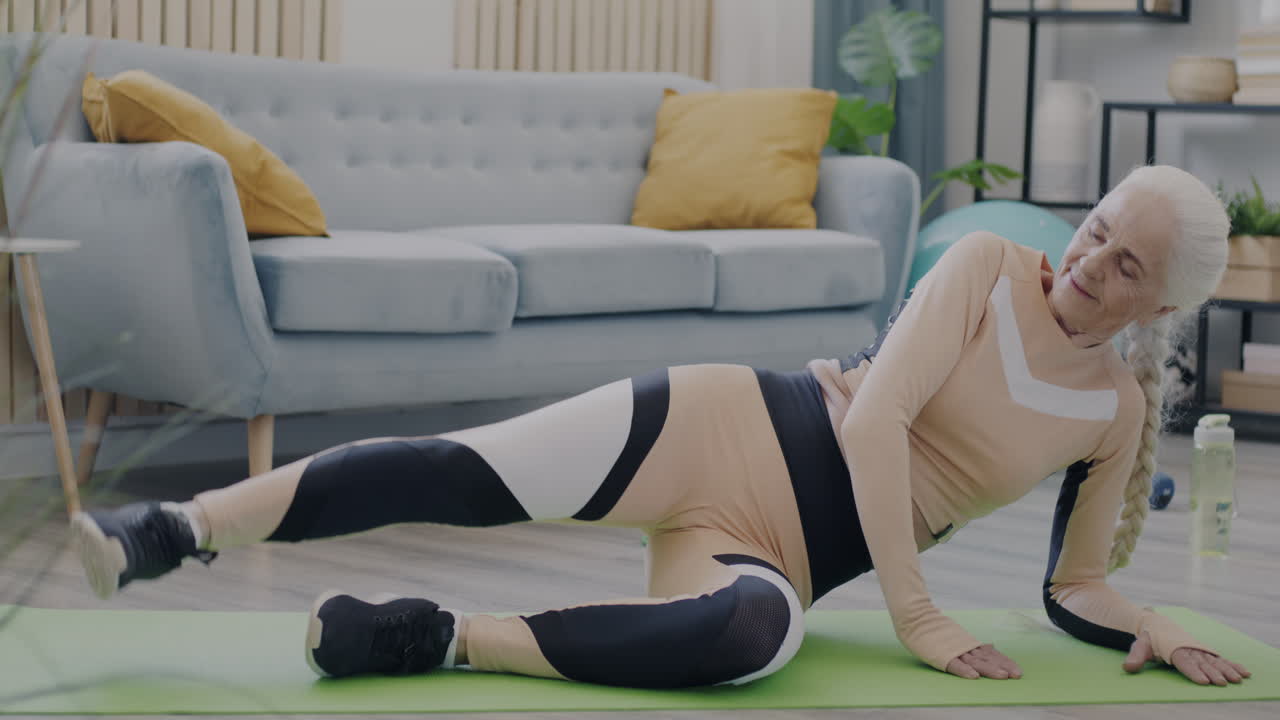 Senior Woman Doing Leg Exercises at Home