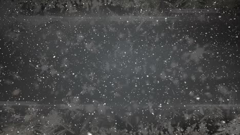 animation of falling snow over dark background