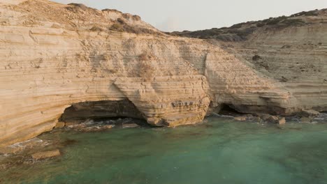 aerial view of coastal cliffs and caves