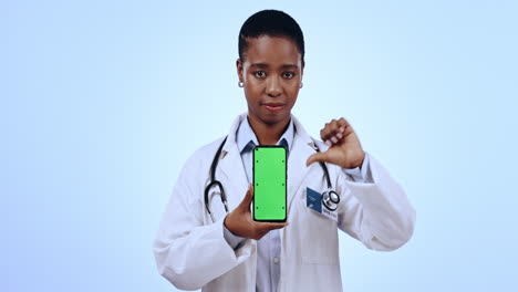 Phone,-green-screen-and-woman-doctor-with-thumbs