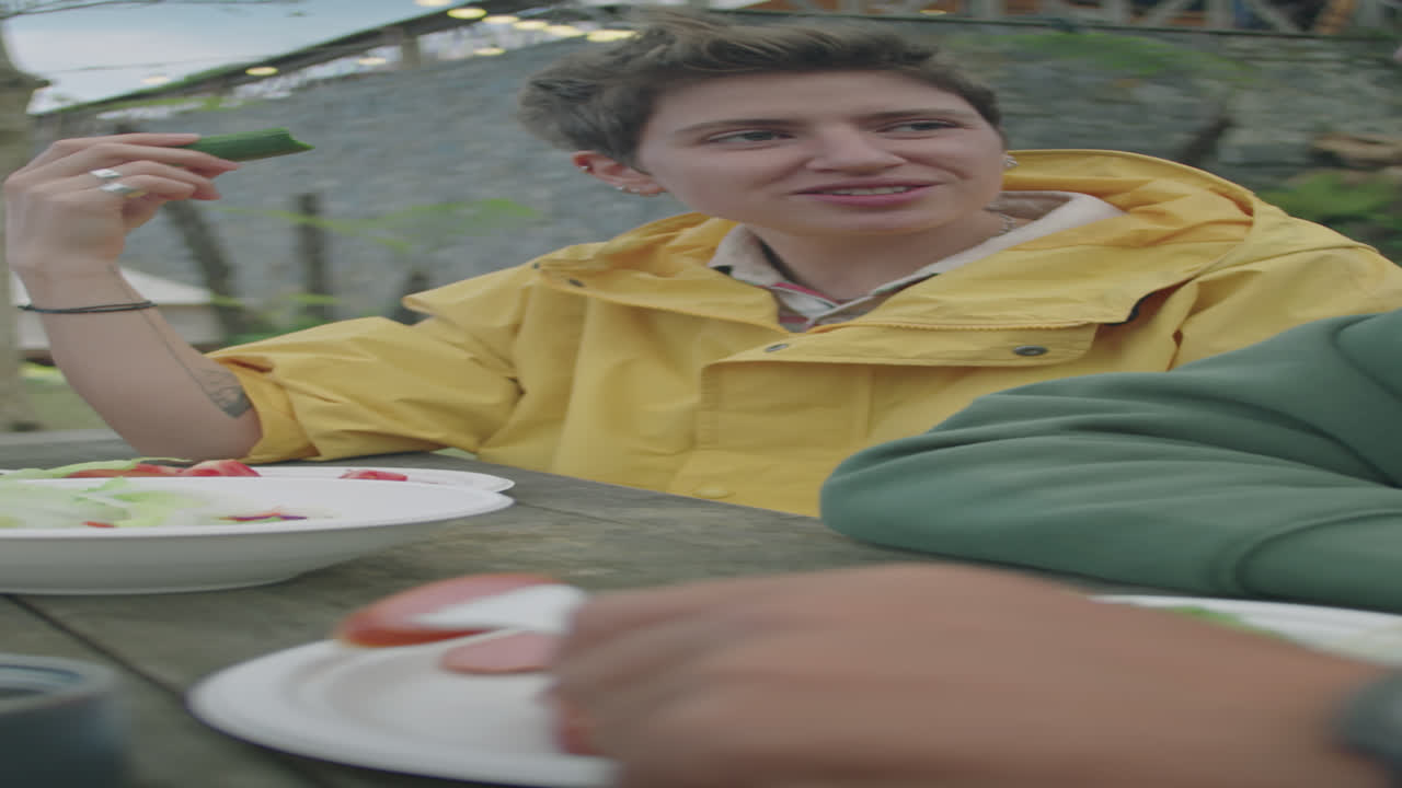 Couple of Tourists Having Dinner and Talking at Glamp