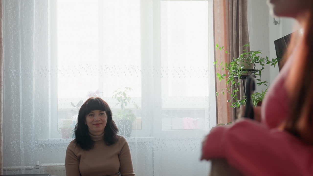 Mother And Daughter Sharing Tender Gift Exchange, Loving Family Scene With Smiling Faces And Gratitude Shown, Mother And Daughter Share Heartfelt Exchange Under Warm Sunlight With Joyful Smiles