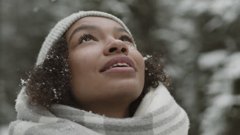 woman enjoying snowfall