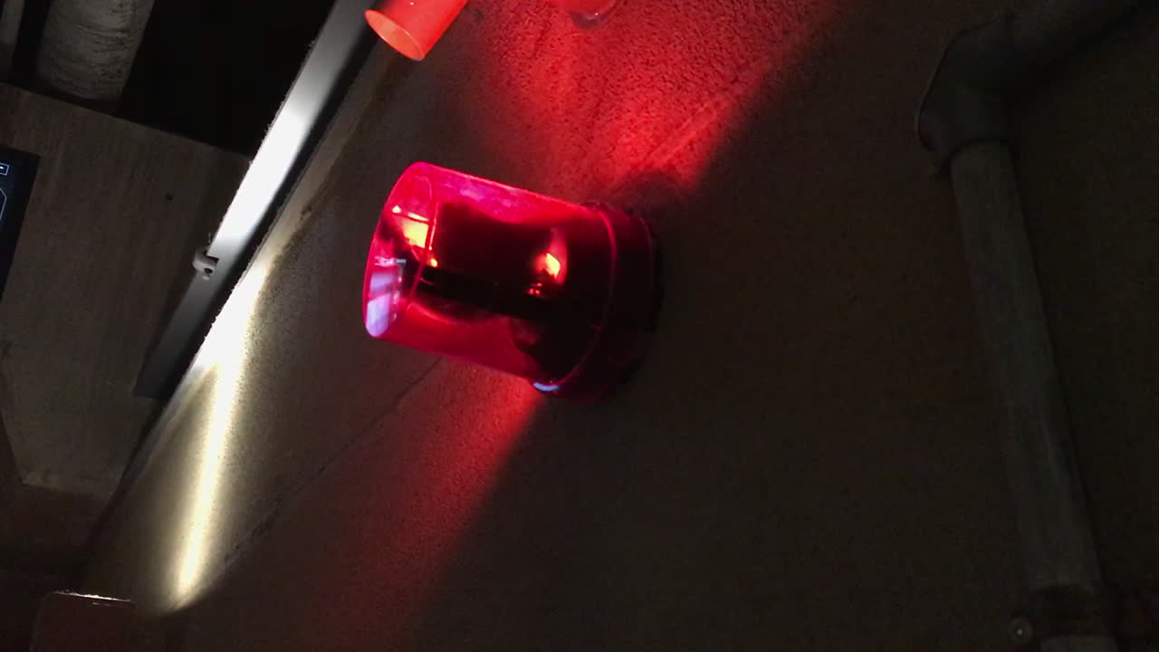 Red light rotating as a warning or alarm