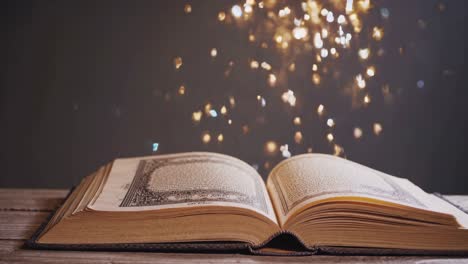open antique book with sparkling background