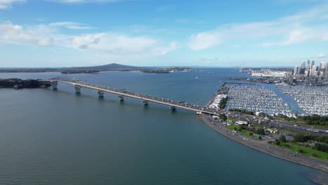 auckland harbour bridge crossing waitemata harbour in auckland, new zealand