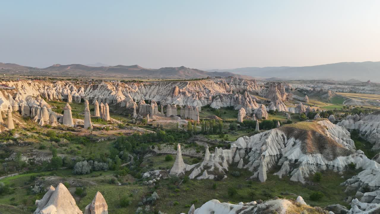 Majestic Cappadocia landscape of unique rock formations at sunrise