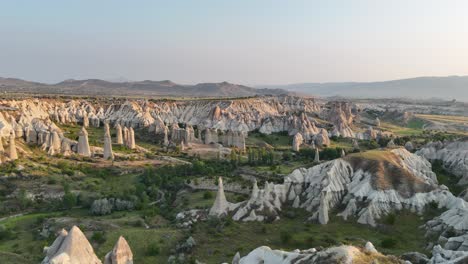 majestic cappadocia landscape of unique rock formations at sunrise