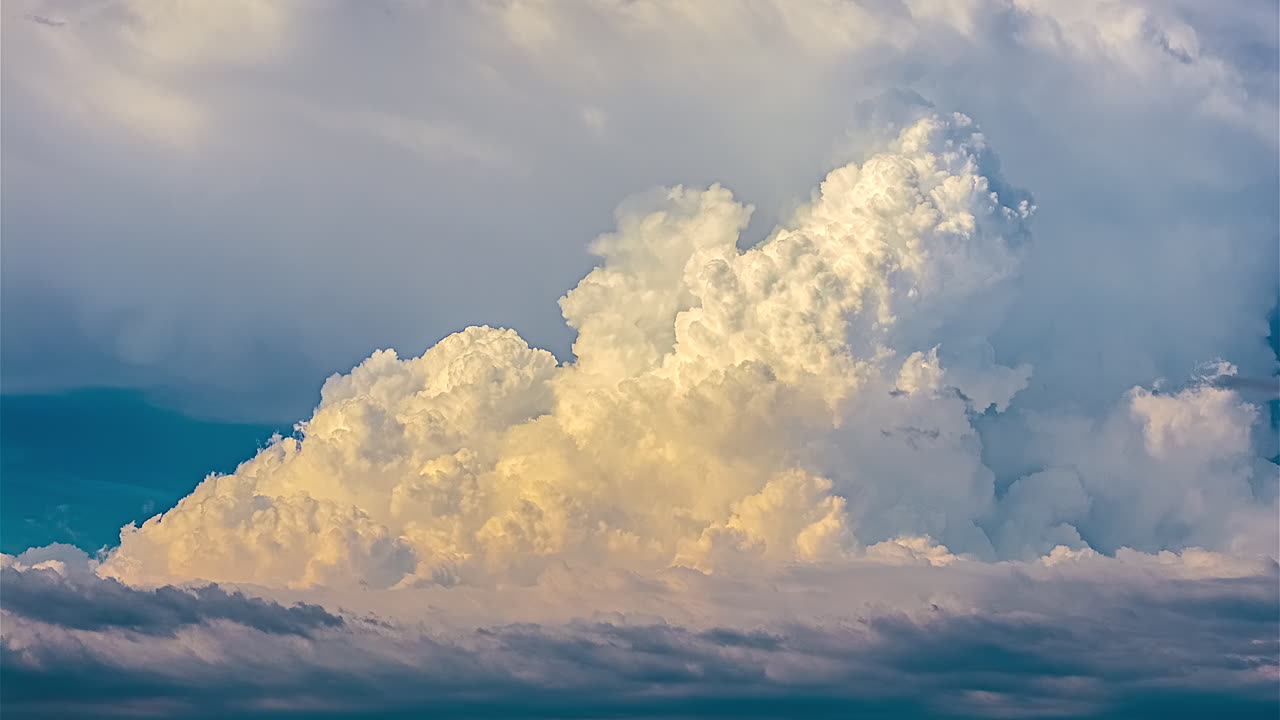 Dramatic clouds move swiftly creating a serene hyperlapse sky view