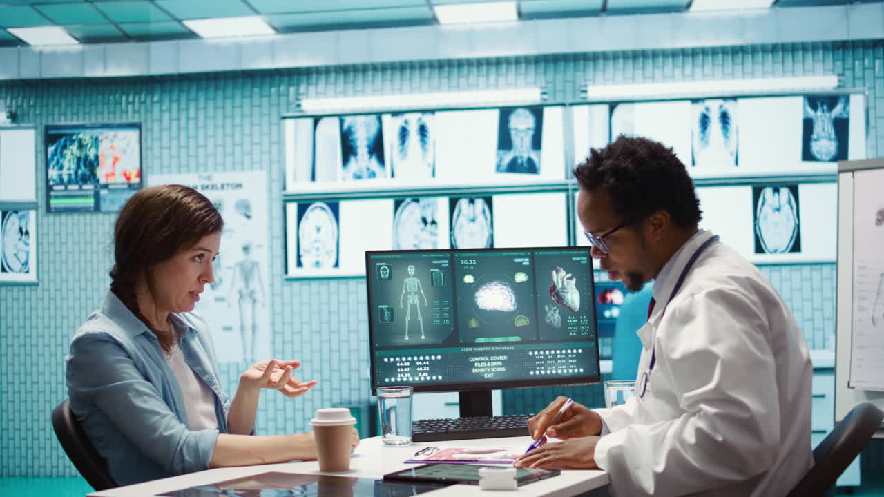 Doctor reading x ray imaging for a diagnostic report at consultation