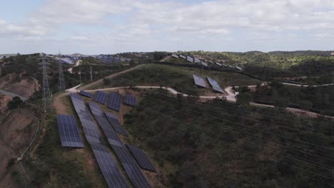 aerial approaching view of photovoltaic plant of morgado de arge in portugal