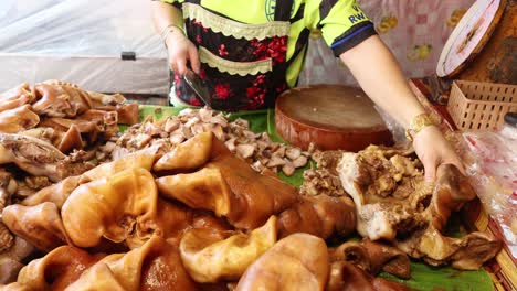 person arranging and preparing food on a table