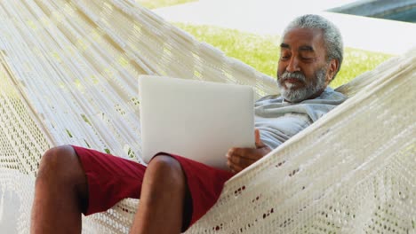 senior man using laptop