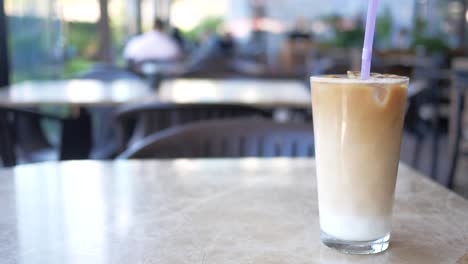 iced latte in outdoor cafe