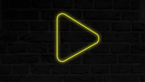 animación de un icono de juego de neón parpadeante sobre una pared de ladrillo