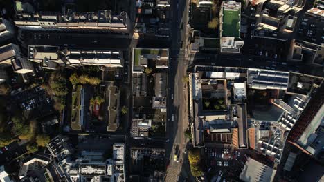Top-Down-Aerial-View,-Street-Traffic-and-Buildings,-Dublin-Downtown-Residential-Neighborhood,-Ireland