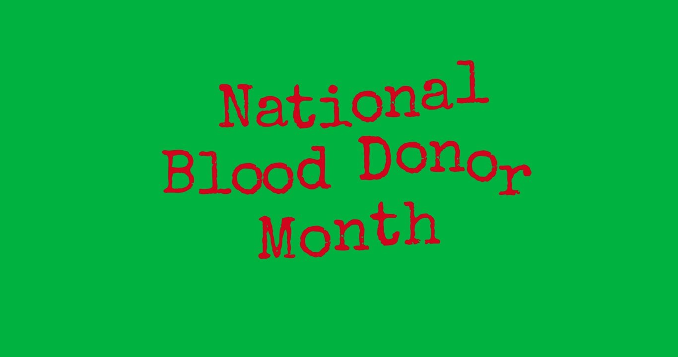 Animazione digitale di un banner testuale per il mese nazionale del donatore di sangue su sfondo nero.