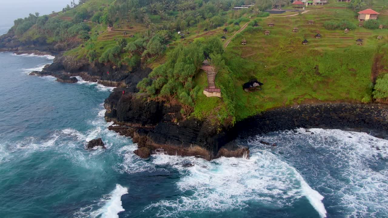 Aerial view on viewpoint platform on cliff near Menganti beach on Java Indonesia