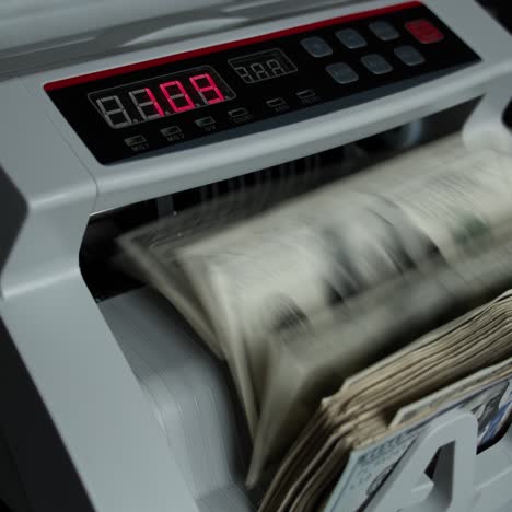 automated money counter in action
