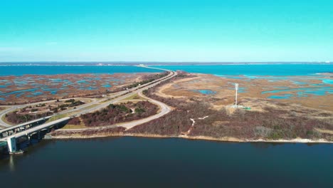 long island south shore draw bridge in winter as seen by a drone