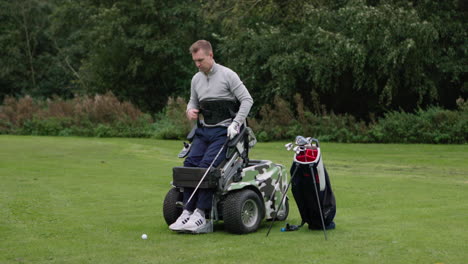 man playing golf in a wheelchair
