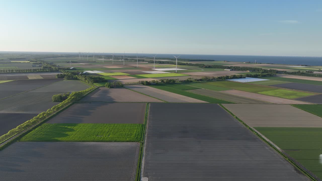 dutch countryside wind turbines, showcasing, renewable energy, sustainable energy generation in The Netherlands. Aerial view.
