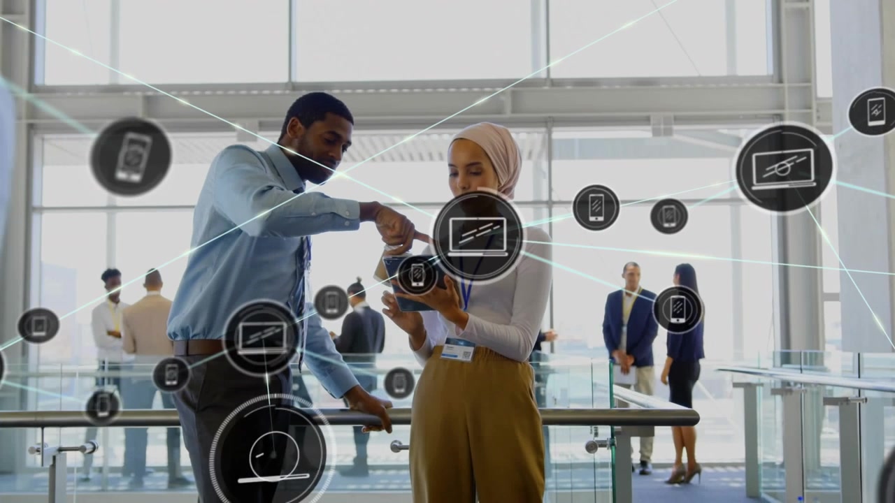 Multi ethnic business executives discuss over digital tablet in office