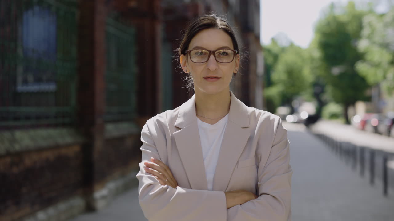 Woman in Beige Jacket on City Street