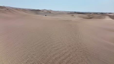 dune buggies in huacachina, peru desert