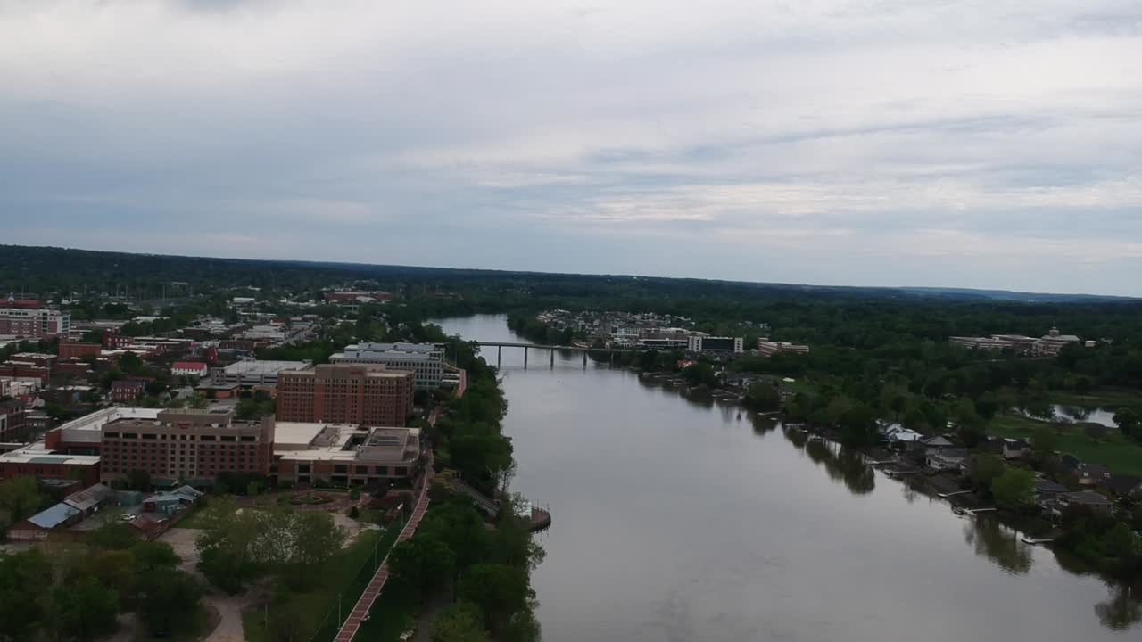 Drone fly over Augusta canal with Augusta Georgia on the left and North Augusta South Carolina on the right