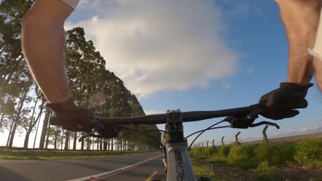 cyclists riding on bike path, pov action camera shot