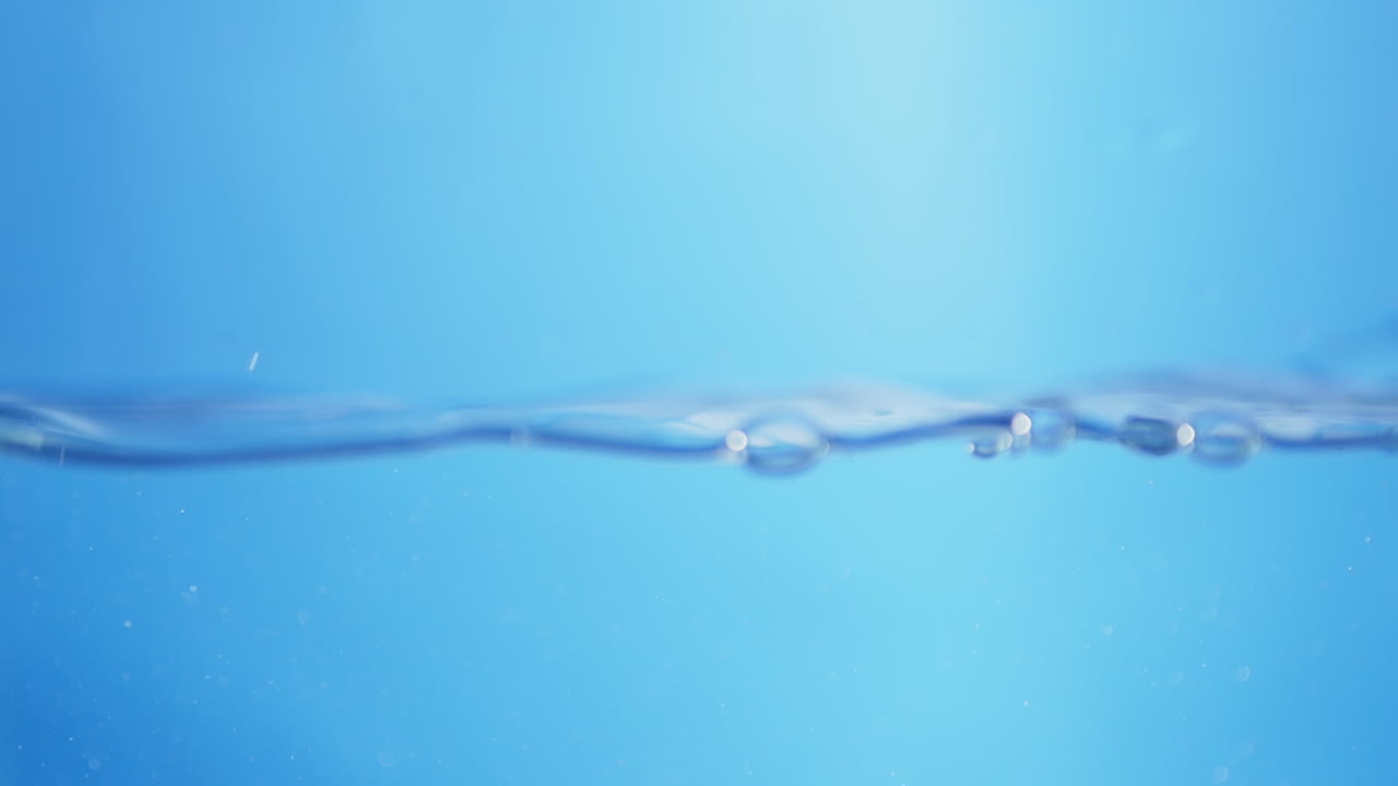 Close-up of a Water Surface with Bubbles