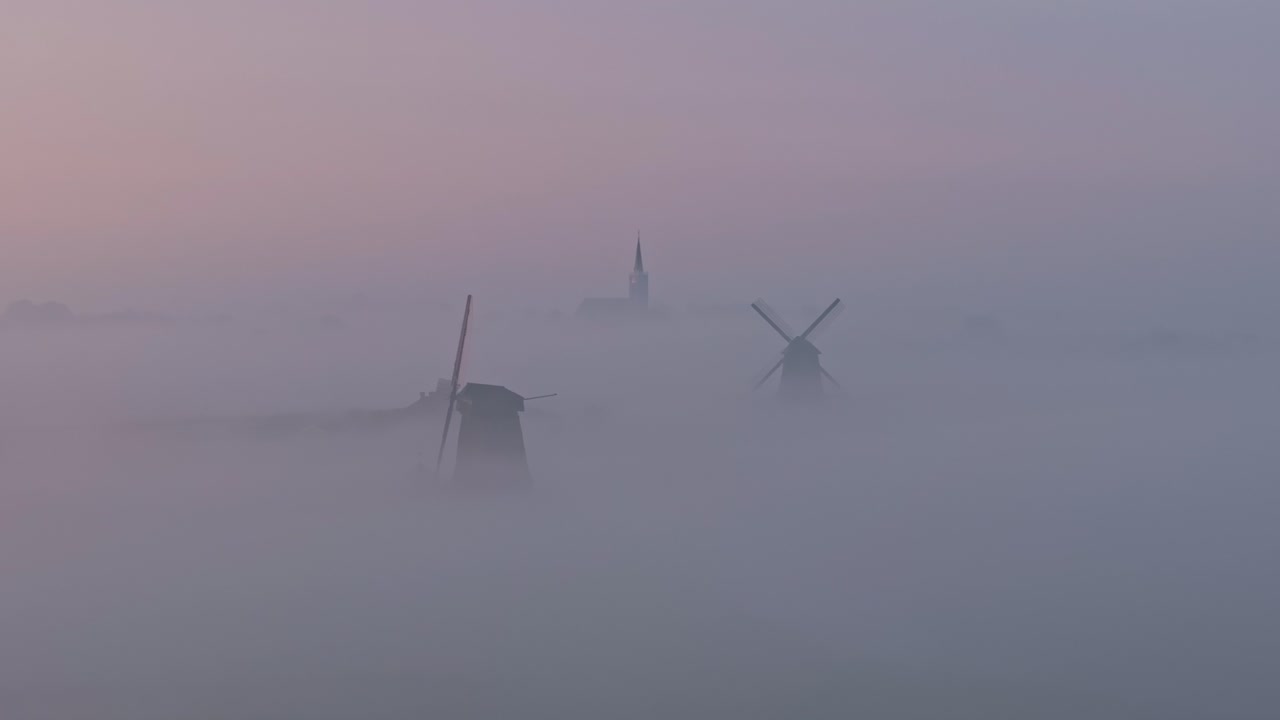 Bovenmolen G og Grote Kerk i tåget Schermerhorn, Holland