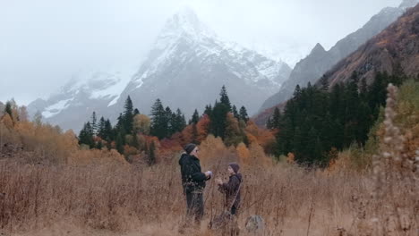 couple proposing in autumn mountains