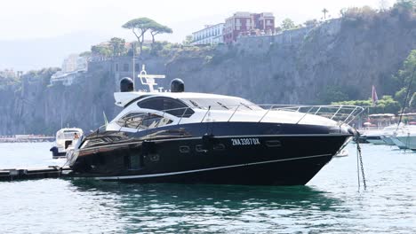 a yacht anchored near sorrento's scenic cliffs