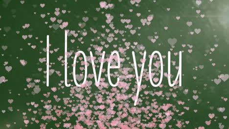 animation of i love you text with pink heart shapes flying on green background